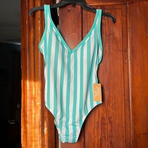 BRAND NEW Kona Sol™ Women's V-Neck Over the Shoulder High Leg One Piece Swim